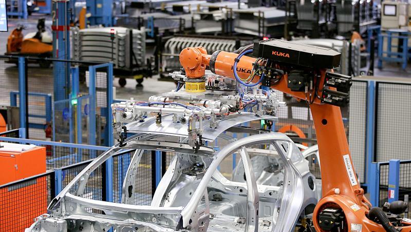Roboter des Roboterbauers Kuka bauen im Ford-Werk in Köln eine Karosserie zusammen. (. Roboter des Roboterbauers Kuka bauen im Ford-Werk in Köln eine Karosserie zusammen. (.