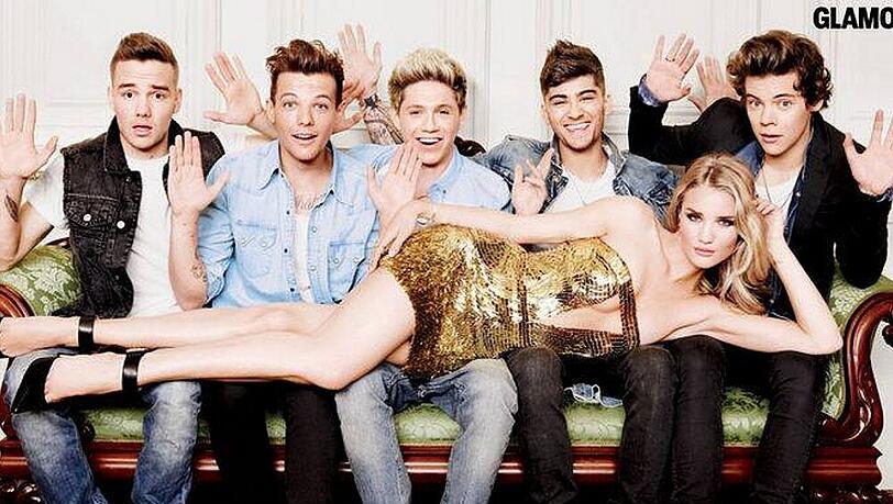 Finger weg! Harry Styles (re.) und seine Kollegen von One Direction mit Rosie Huntington-Whiteley in der "Glamour"
