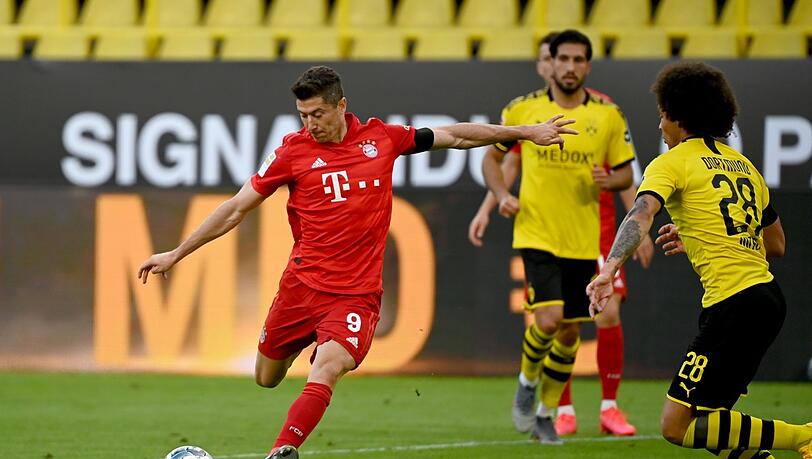 Die Titelfrage: Holen Robert Lewandowski (l.) und die Bayern ihren neunten Titel in Folge oder grätschen die Dortmunder dazwischen?