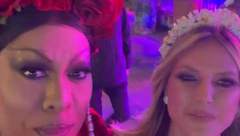 Farbenfroh und fr&ouml;hlich: Dragqueen Catherrine Leclery und Heidi Klum auf dem Weg in die Br&auml;urosl.