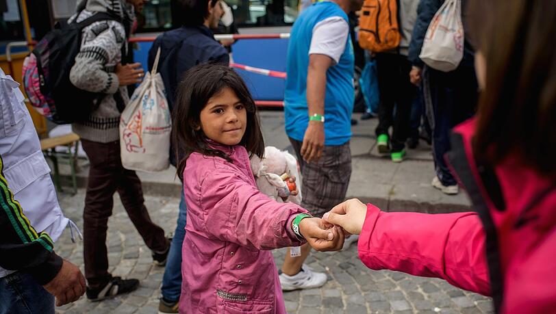 Flüchtlinge kommen am Hauptbahnhof München an. Flüchtlinge kommen am Hauptbahnhof München an.