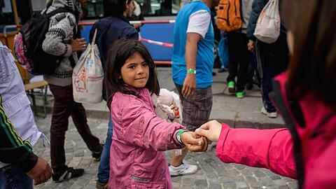 Flüchtlinge kommen am Hauptbahnhof München an.