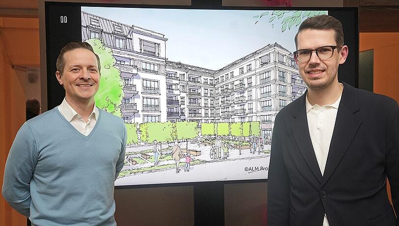 Christian Bosiljanoff (l.), der Chef von Pembroke Deutschland, mit Projektleiter Thomas Spitzer. Sie stehen vor einer Zeichnung, die zeigt, wie der geplante Neubau mal ausschauen soll.