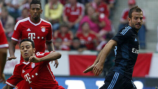 Durchsetzungsstark: Thiago bei seinem ersten Spiel für den FC Bayern München gegen den HSV. Durchsetzungsstark: Thiago bei seinem ersten Spiel für den FC Bayern München gegen den HSV.