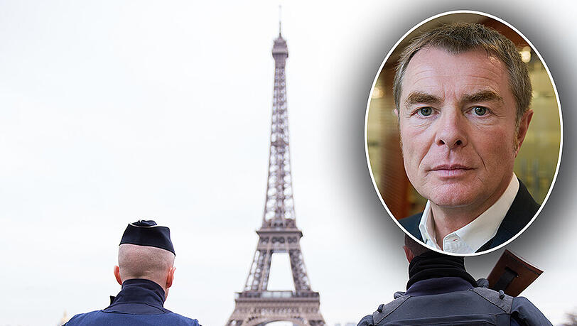 Zwei Polizisten vor dem Eiffelturm in Paris: "Viele Menschen fühlen sich sicherer, wenn sie mehr Polizei oder Militär sehen", sagt Spahn. Zwei Polizisten vor dem Eiffelturm in Paris: "Viele Menschen fühlen sich sicherer, wenn sie mehr Polizei oder Militär sehen", sagt Spahn.