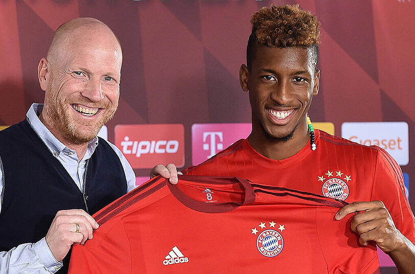FC-Bayern-Sportvorstand Matthias Sammer mit Neuzugang Kingsley Coman (rechts).