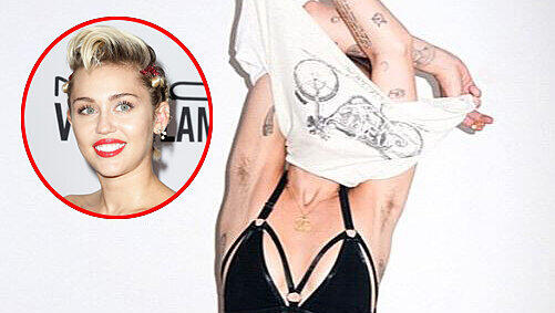 Miley Cyrus postete auf Instagram ein Foto eines Shootings, auf dem sie ein Shirt über ihren Kopf zieht und beschwerte sich, dass viele Fotografen ihre Achsel-Behaarung mit Photoshop wegradieren. Miley Cyrus postete auf Instagram ein Foto eines Shootings, auf dem sie ein Shirt über ihren Kopf zieht und beschwerte sich, dass viele Fotografen ihre Achsel-Behaarung mit Photoshop wegradieren.