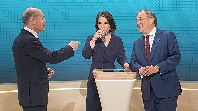 Gute Stimmung trotz hartem Schlagabtausch: SPD-Kandidat Olaf Scholz (l.), Grünen-Chefin Annalena Baerbock und Kanzlerkandidat Armin Laschet (CDU).