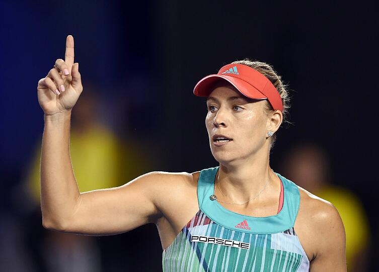 "Ich bin ein Grand-Slam-Champion, das klingt so verrückt", sagte Angelique Kerber nach dem 6:4, 3:6, 6:4 im Finale der Australian Open gegen Titelverteidigerin Serena Williams (USA). Die Bilder des Wahnsinns-Finale...