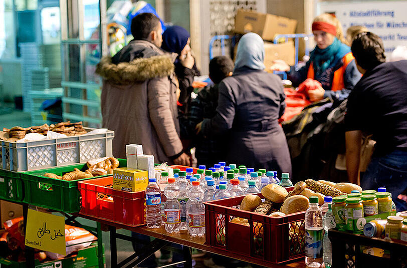 Die ersten knapp 100 Flüchtlinge sind in München eingetroffen.