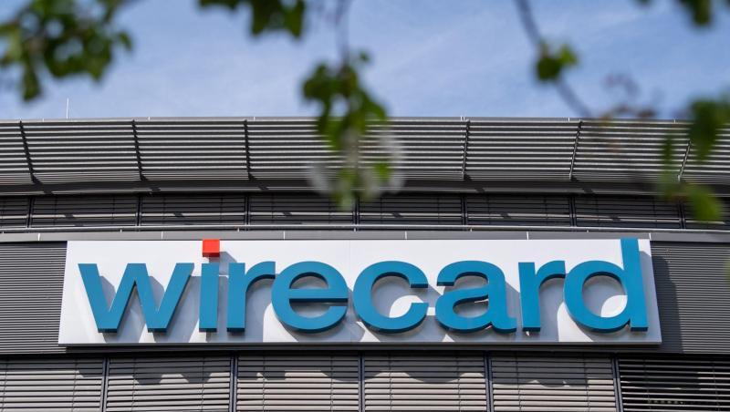 Schriftzug von Wirecard hängt an einem Gebäude. Foto: Peter Kneffel/Archivbild Schriftzug von Wirecard hängt an einem Gebäude. Foto: Peter Kneffel/Archivbild