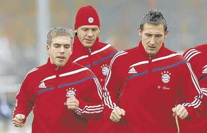 Wieder an Bord: Miroslav Klose (r.), hier bei einer Laufeinheit mit Philipp Lahm (l.).