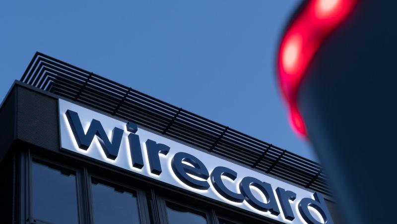 Der Schriftzug von Wirecard ist an der Firmenzentrale zu sehen. Foto: Peter Kneffel/dpa Der Schriftzug von Wirecard ist an der Firmenzentrale zu sehen. Foto: Peter Kneffel/dpa