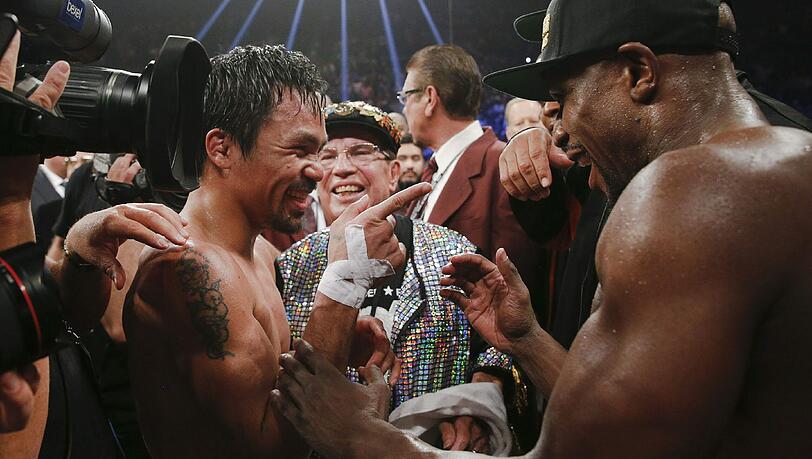 Floyd Mayweather hat den Angriff von Manny Pacquiao im Rekord-Boxkampf erfolgreich abgewehrt und bleibt auch in seinem 48. Profi-Duell ungeschlagen.