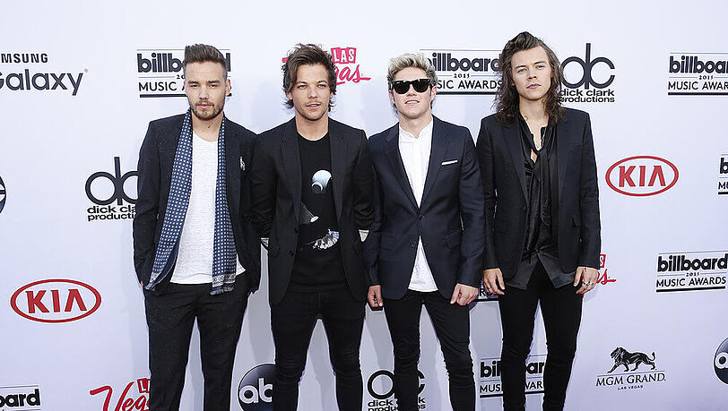 One Direction gehörten bei den diesjährigen Billboard Music Awards zu den Abräumern - der Ruhm scheint den Jungs ein bisschen zu Kopf zu steigen One Direction gehörten bei den diesjährigen Billboard Music Awards zu den Abräumern - der Ruhm scheint den Jungs ein bisschen zu Kopf zu steigen