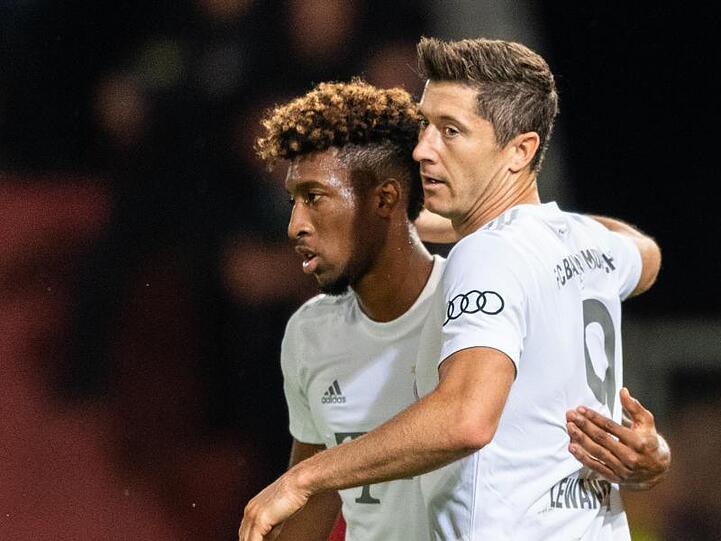 Robert Lewandowski (r) und Kingsley Coman. Foto: Robert Michael