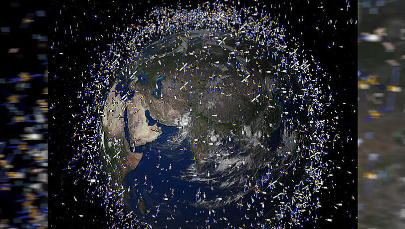 Ganz schön zugemüllt: Das computergenerierte Bild der European Space Agency (ESA) zeigt Weltraummüll früherer Weltraummissionen, der neben intakten Satelliten um die Erde kreist. Ganz schön zugemüllt: Das computergenerierte Bild der European Space Agency (ESA) zeigt Weltraummüll früherer Weltraummissionen, der neben intakten Satelliten um die Erde kreist.