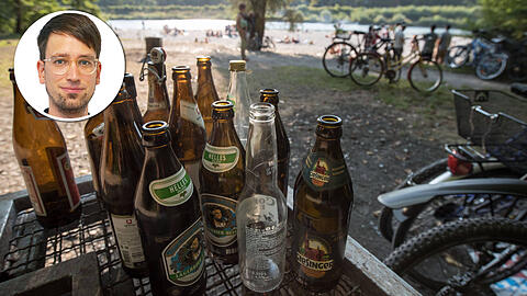 Mal ein Bier oder ein Glas Wein an der Isar trinken &ndash; auch das gehört für viele zum Münchner Lebensgefühl dazu.