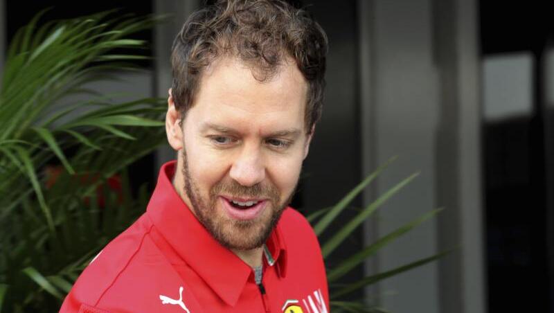 Freut sich über seinen neuen Dienstwagen: Ferrari-Pilot Sebastian Vettel. Freut sich über seinen neuen Dienstwagen: Ferrari-Pilot Sebastian Vettel.