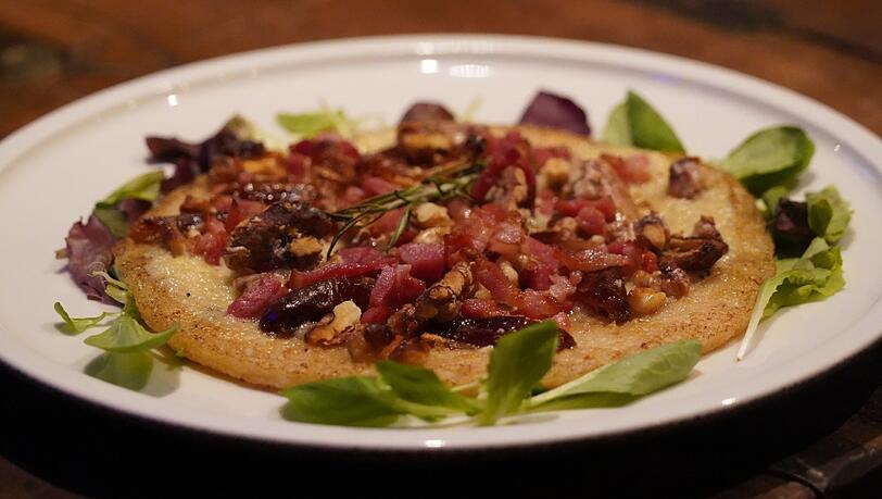 Klein, aber ausgezeichnet und sehr sättigend: die Reis-Pizza. Klein, aber ausgezeichnet und sehr sättigend: die Reis-Pizza.