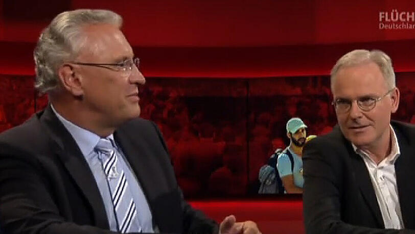 Sehr zum Erstaunen von Focus-Chefredakteur Ulrich Reitz (r.) erfreute sich Bayerns Innenminister Joachim Herrmann (l.) bei "Hart aber fair" über den "Neger" Roberto Blanco. Sehr zum Erstaunen von Focus-Chefredakteur Ulrich Reitz (r.) erfreute sich Bayerns Innenminister Joachim Herrmann (l.) bei "Hart aber fair" über den "Neger" Roberto Blanco.