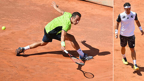 Philipp Kohlschreiber (links) schaltete den an zwei gesetzten Italiener Fabio Fognini aus.