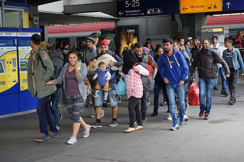 Flüchtlinge kommen am Hauptbahnhof München an.