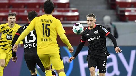 Der Leverkusener Florian Wirtz (r) erzielte gegen den BVB den Siegtreffer.