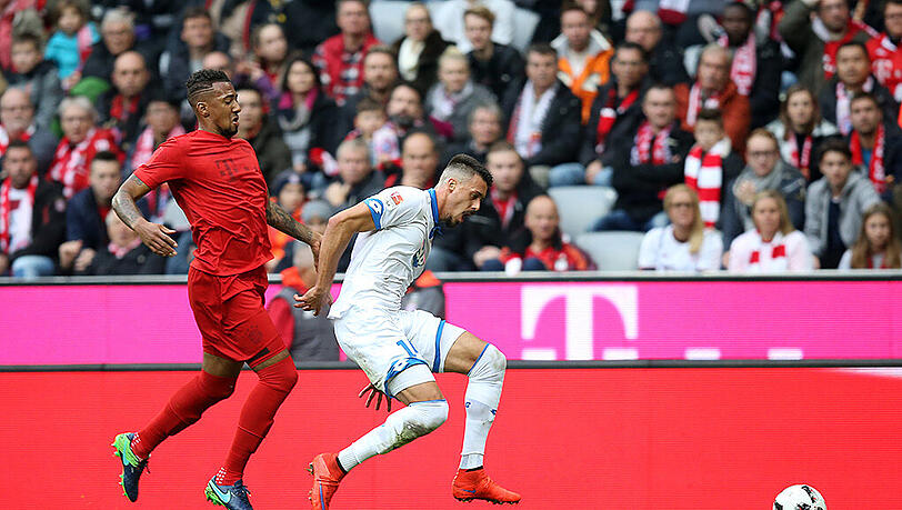 Jérôme Boateng (l.) hier im Duell mit Hoffenheims Sandro Wagner. Jérôme Boateng (l.) hier im Duell mit Hoffenheims Sandro Wagner.