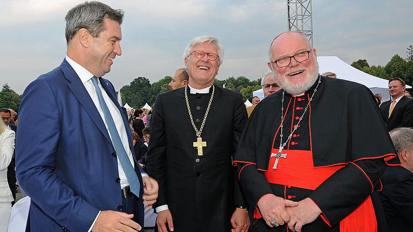 Bayerns Ministerpräsident Markus Söder, Heinrich Bedford-Strohm, Landesbischof der Evangelisch-Lutherischen Kirche in Bayern und Ratsvorsitzender der Evangelischen Kirche in Deutschland sowie Reinhard Marx, Erzbischof von München und Freising und Vorsitzender der Deutschen Bischofskonferenz (von links).