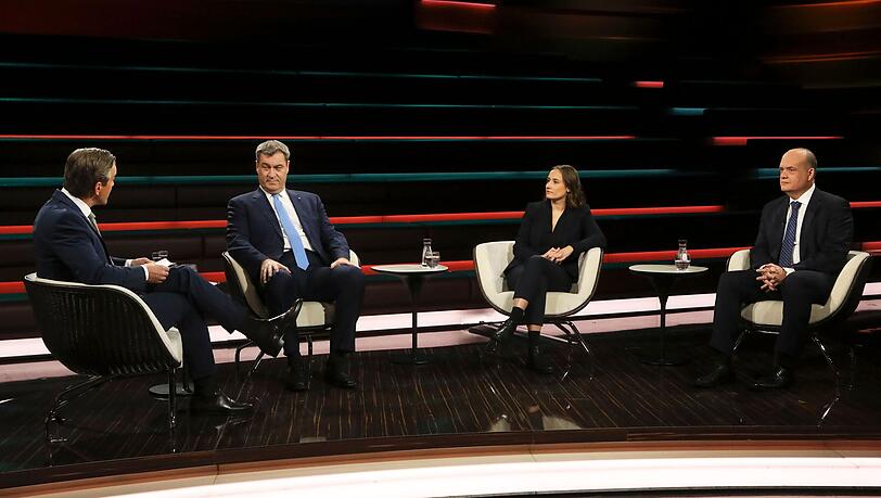 Am Mittwochabend debattierte Markus Lanz (links) mit seinen Gästen (von links) Markus Söder, Franziska Tschinderle und Robin Alexander unter anderem über die deutsche Wirtschafts- und Finanzlage. Am Mittwochabend debattierte Markus Lanz (links) mit seinen Gästen (von links) Markus Söder, Franziska Tschinderle und Robin Alexander unter anderem über die deutsche Wirtschafts- und Finanzlage.
