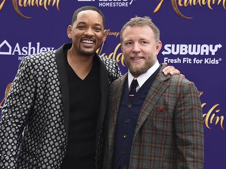Der Schauspieler Will Smith (l) und Regisseur Guy Ritchie starten gemeinsam durch.