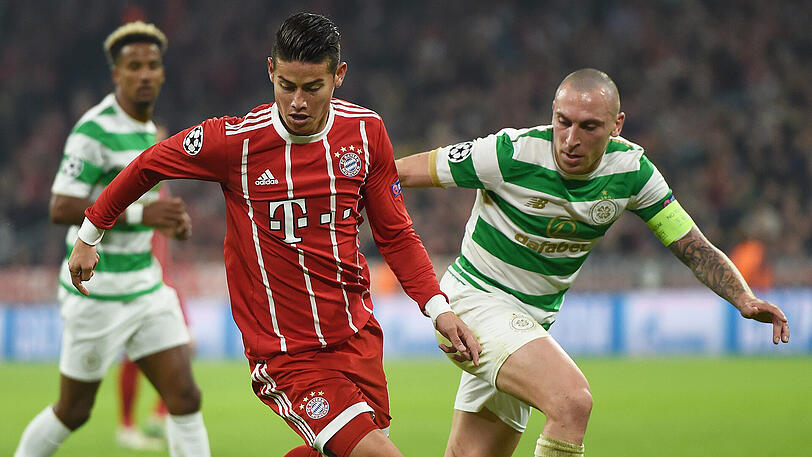 Szene aus dem Hinspiel am 18. Oktober in der Allianz Arena: James Rodríguez muss sich der Attacke von Celtic-Kapitän Scott Brown (rechts) erwehren. Die Münchner gewannen die Partie mit 3:0.