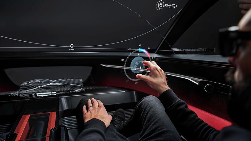 Analoge Handbewegung, virtuelle Bedienung, hier der Klima-Drehregler im Audi activesphere concept.