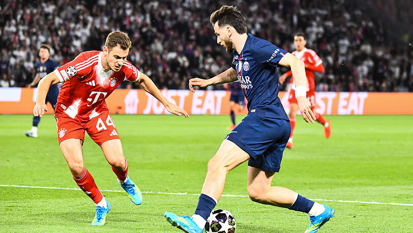 Schwerstarbeit: Bayerns Josip Stanisic (l.) gegen Khvicha Kvaratskhelia.