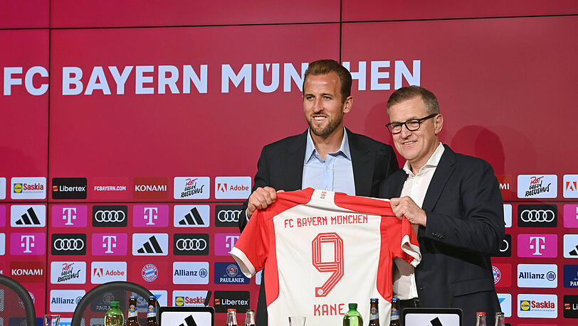 Toptransfer: Dreesen mit Harry Kane (l.).