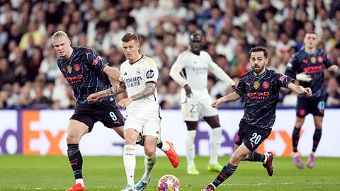 Toni Kroos (M) und Real Madrid trennten sich von Manchester City mit 3:3.