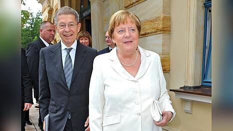 Angela Merkel und Joachim Sauer anl&auml;sslich der Er&ouml;ffnung der Richard-Wagner-Festspiele im Juli 2025 in Bayreuth.