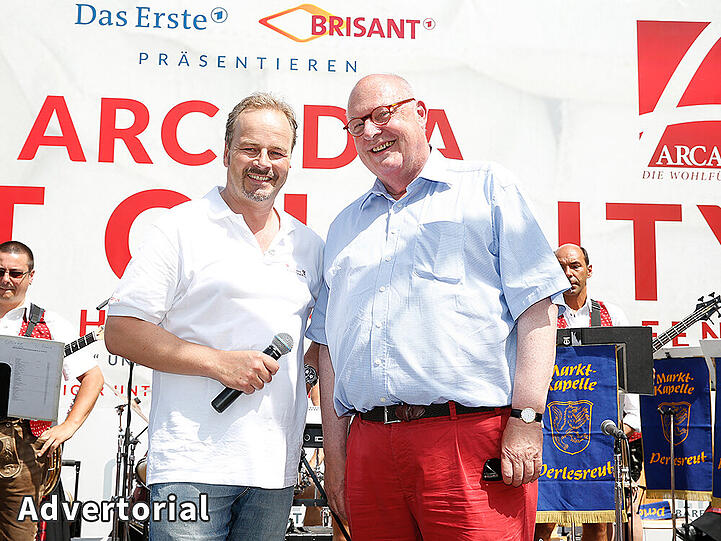 Dr. Baumhögger (re.) bei dem ARCADIA Flut Charity Event