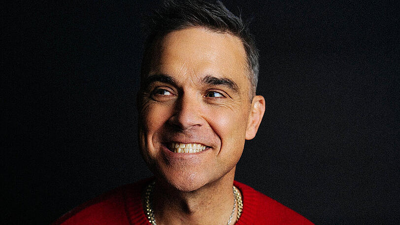 Robbie Williams hat seine Version des traditionellen Weihnachtsliedes "Can't Stop Christmas" veröffentlicht