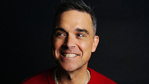 Robbie Williams hat seine Version des traditionellen Weihnachtsliedes "Can't Stop Christmas" veröffentlicht