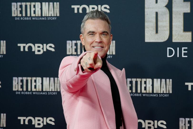 Der Sänger Robbie Williams.