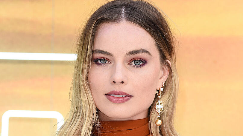 Margot Robbie will mit Harry und Meghan Zeit verbringen.