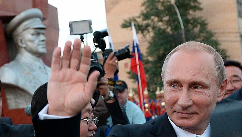 Russlands Präsident Wladimir Putin, hier auf Besuch in der Mongolei, sorgt in den USA für heftige Debatten. Russlands Präsident Wladimir Putin, hier auf Besuch in der Mongolei, sorgt in den USA für heftige Debatten.