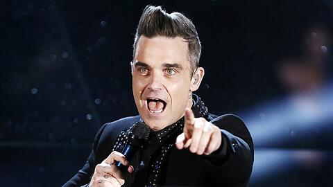 Robbie Williams wird am Samstag in München auf dem Messegelände auftreten.
