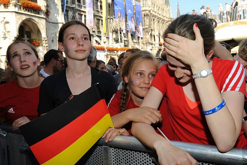 Enttäuschung bei diesen Olympia-Fans auf dem Marienplatz.