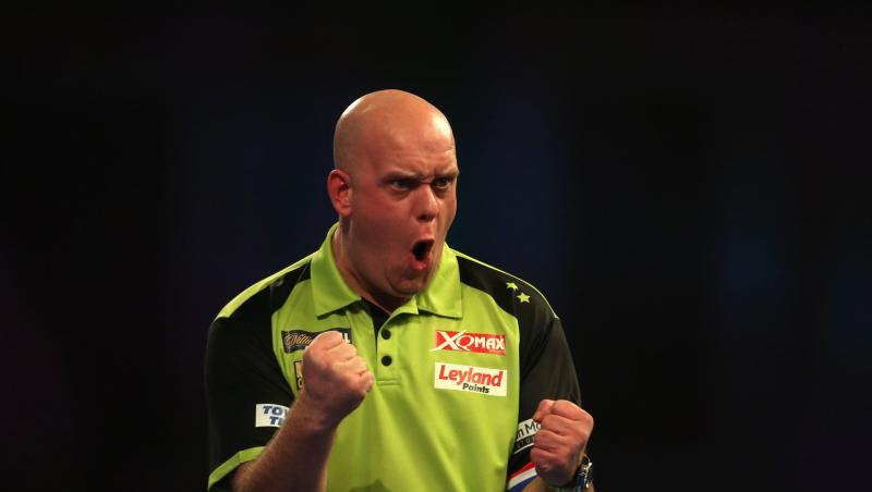 Der Niederländer Michael van Gerwen bei seinem typischen Jubel. Der Niederländer Michael van Gerwen bei seinem typischen Jubel.
