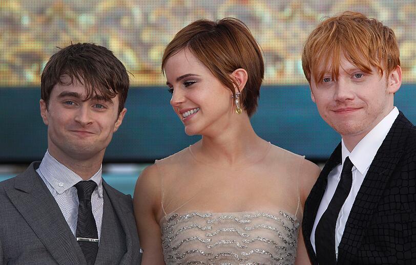Zum letzten Mal vereint: Daniel Radcliffe, Emma Watson und Rupert Grint sind ein bisschen wehmütig auf ihrem letzten roten Harry Potter Teppich.