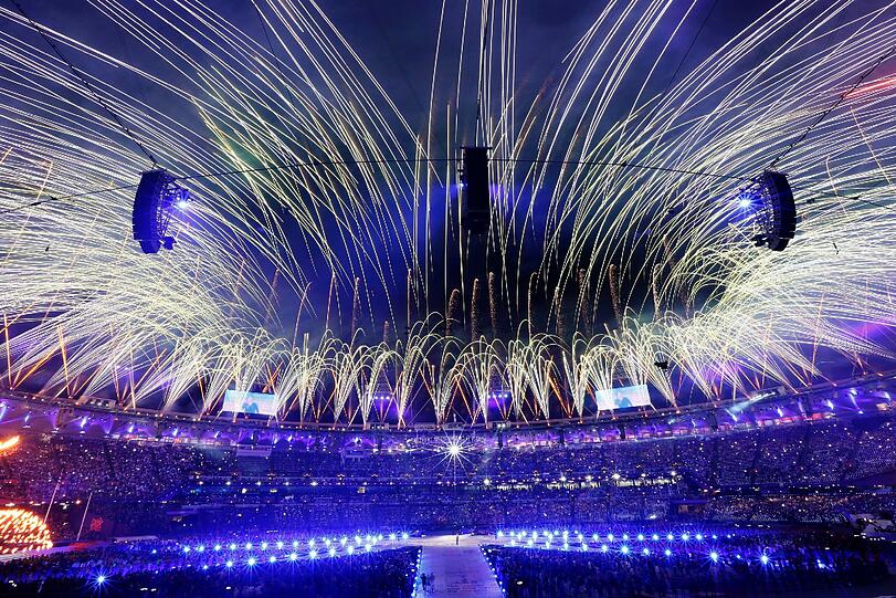 Bei der gigantischen Abschlussfeier der Olympischen Spiele in London heizten Rock- und Popstars wie Queen, George Michael, die Spice Girls und The Who Publikum und Sportlern ein.