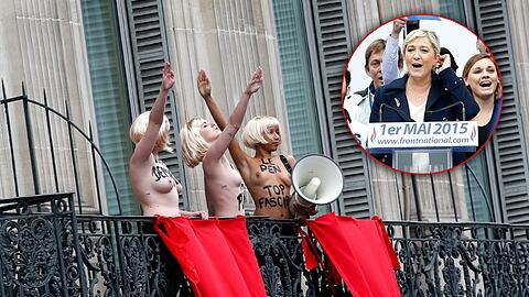 Bei einer Maikundgebung auf dem Pariser Opernplatz zeigten drei Femen-Aktivistinnen der Chefin der rechtsextremen französischen Partei Front National den Hitlergruß. Die Bilder.